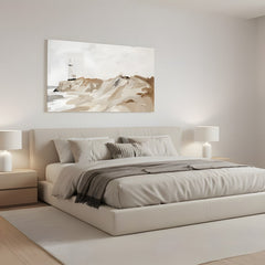 Quadro di un faro su dune beige in camera da letto sopra il letto