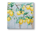 Quadro dipinto a mano su tela con motivo di limoni gialli su rami con foglie verdi – visualizzazione 3D della tela con telaio in legno visibile, Papilora.
