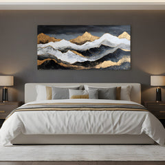 Quadro di montagne oro-bianche su sfondo nero in camera da letto sopra il letto